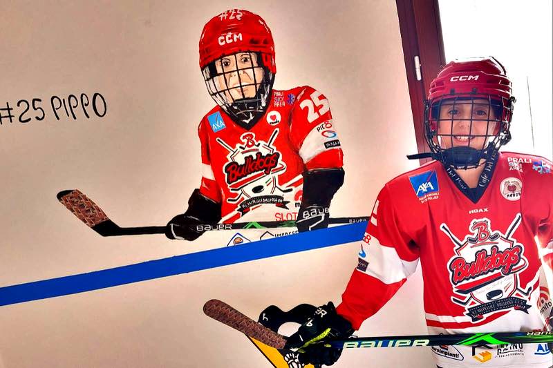 Muralart nella cameretta di un piccolo campione di hockey